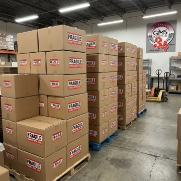 Fragile and handling labels on shipping boxes