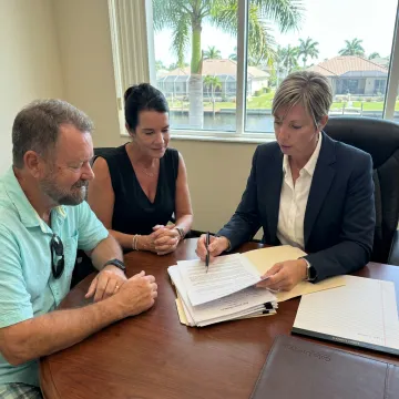 Real estate attorney meeting with clients