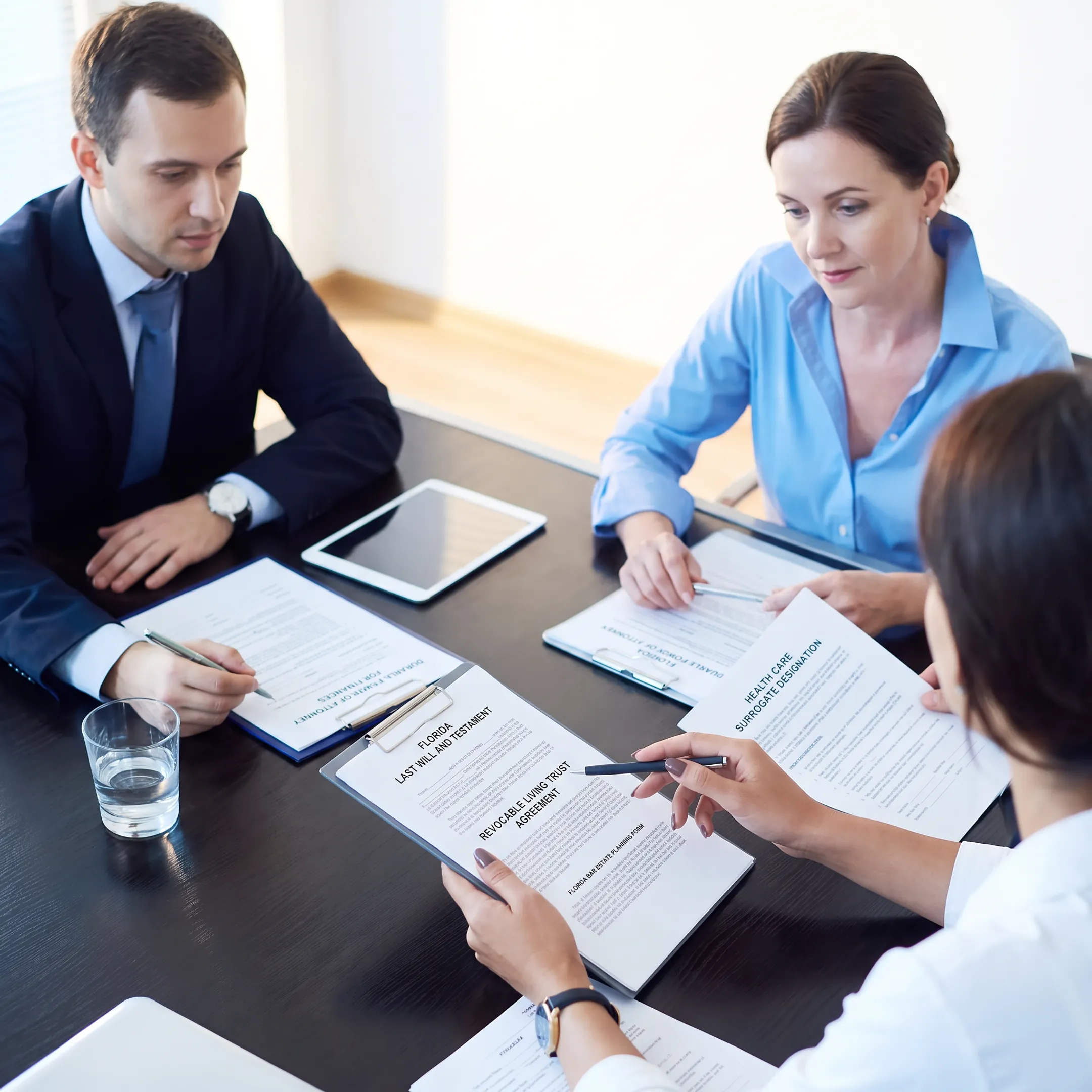 Florida attorney explaining a trust and estate plan to family members