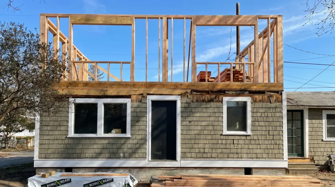 Coastal Massachusetts residential construction framing above garage addition