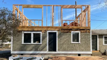 Coastal Massachusetts residential construction framing above garage addition