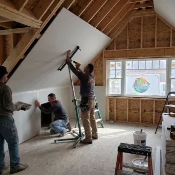 Drywall installation process in a home remodel