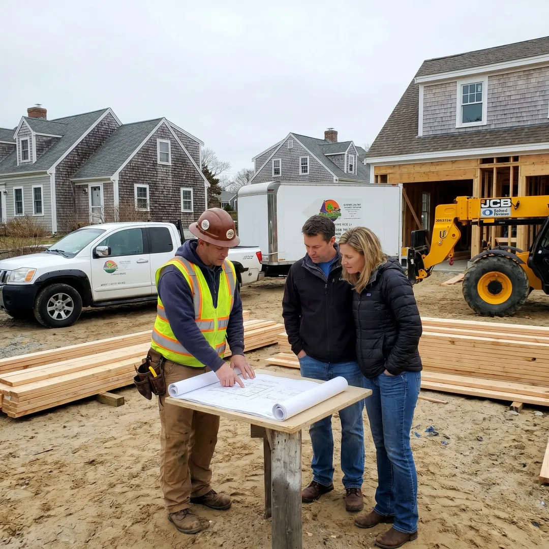 Builder reviewing custom home plans