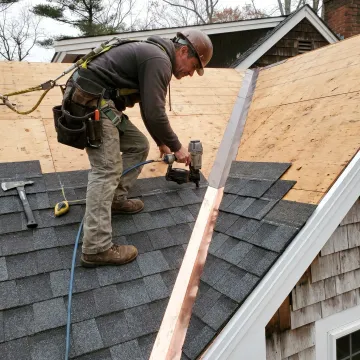 Residential roof installation on a coastal home