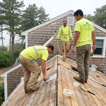 Crew preparing roof for coating