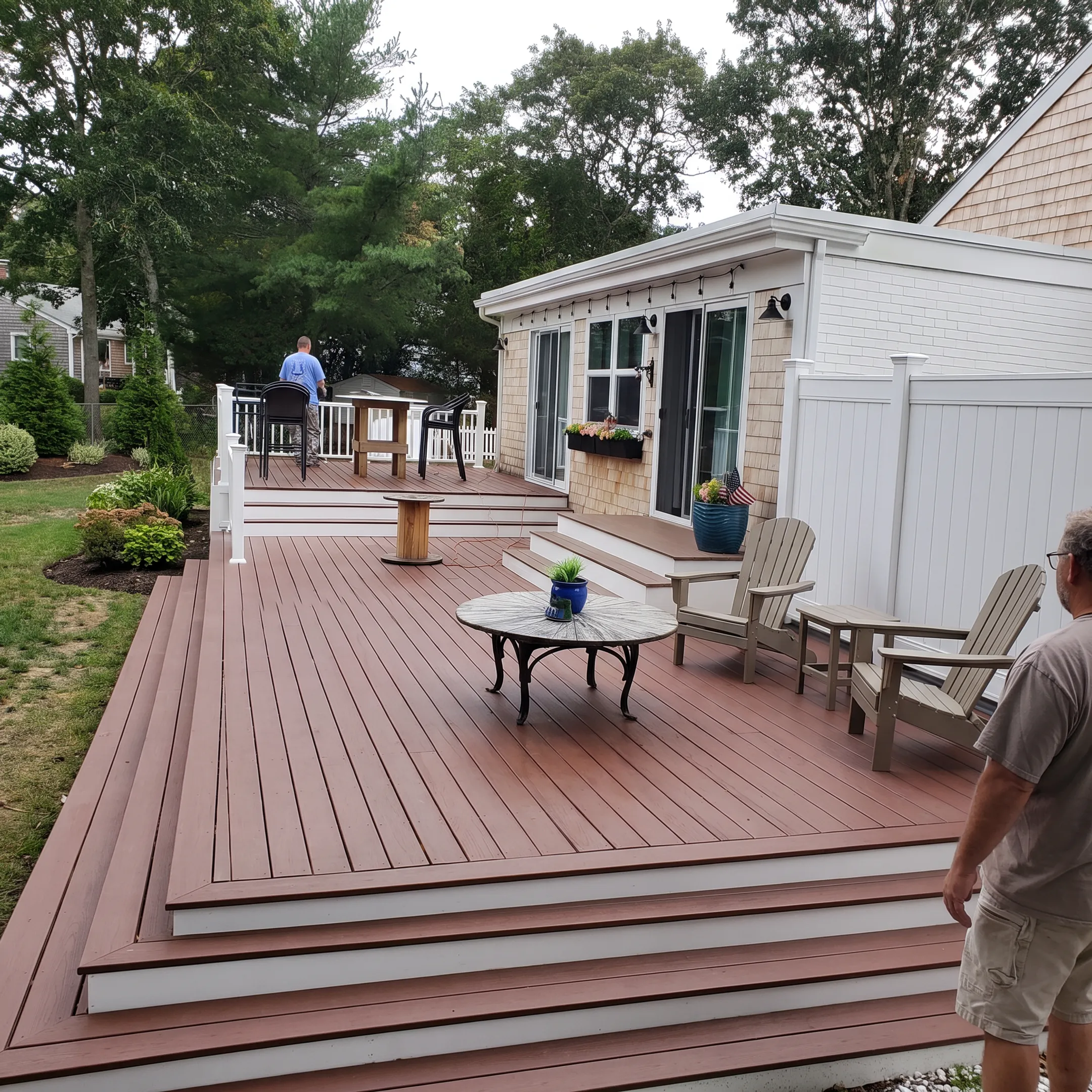 Finished Trex deck behind a coastal home