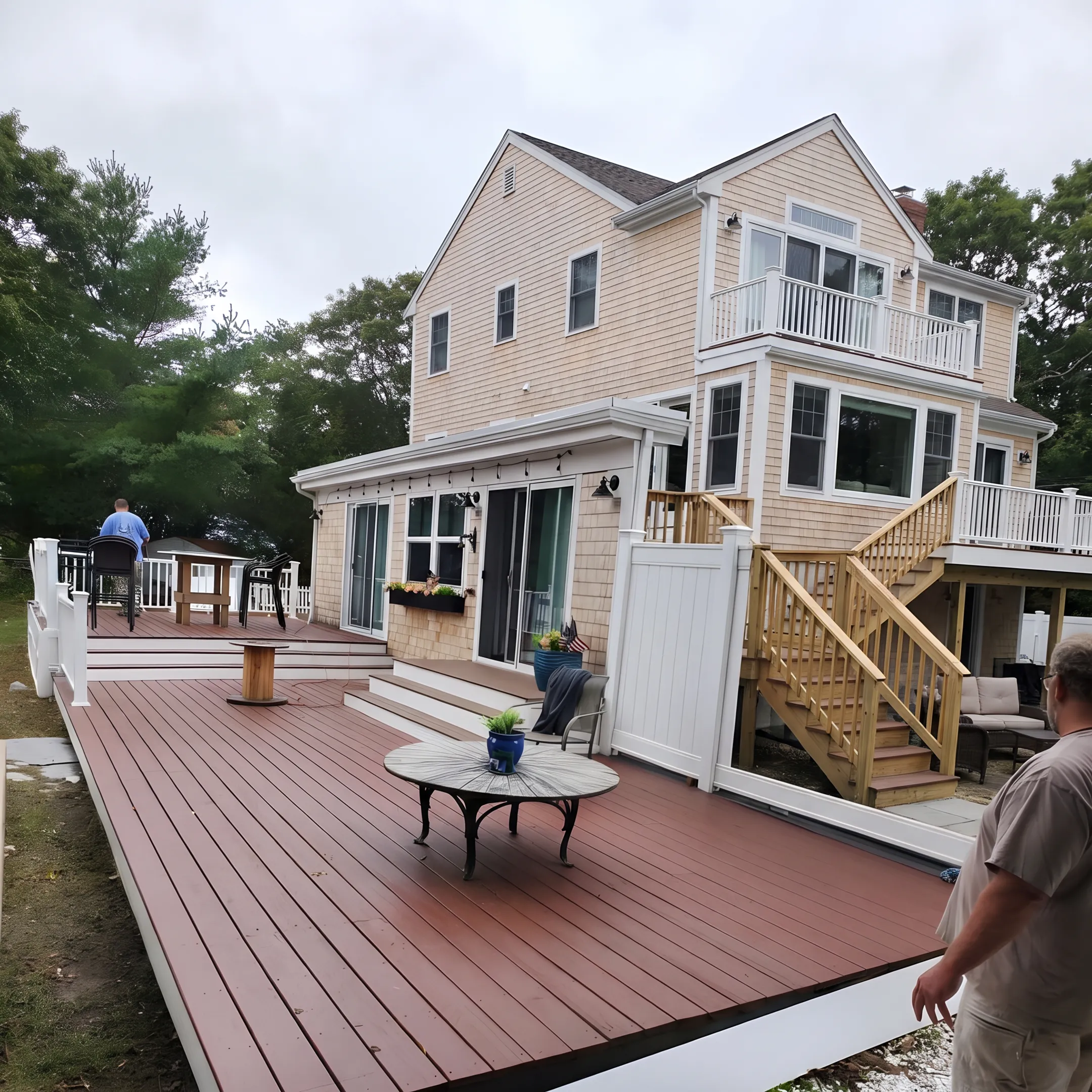 Custom wood deck with stairs at a home
