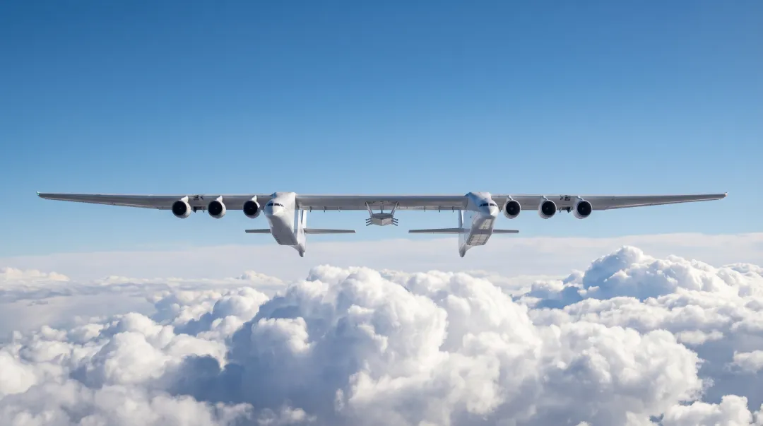 Stratolaunch Roc carrier aircraft in flight showing twin-fuselage design and wingspan
