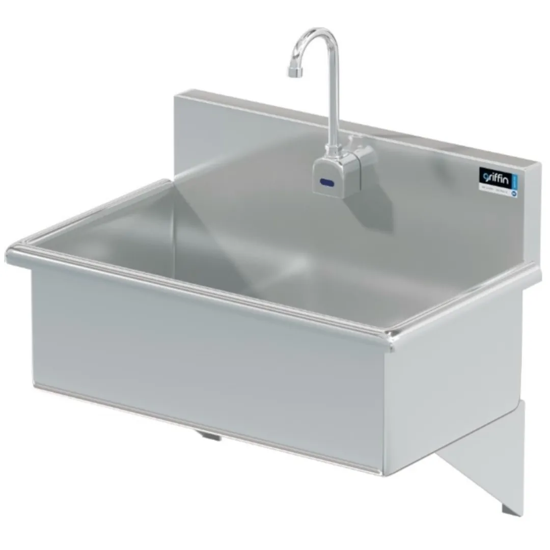 Stainless steel clinical sink in healthcare facility