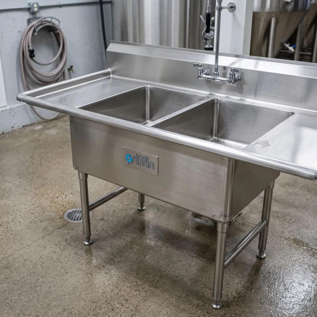 Commercial stainless steel sink with integrated drainboards
