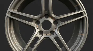 Alloy wheel with visible spoke stress crack damage from overload and impact