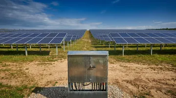 Utility-scale solar PV array with 1500 VDC disconnect switch enclosure installation