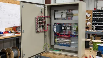 Open chassis soft starter module mounted inside custom UL 508A control panel
