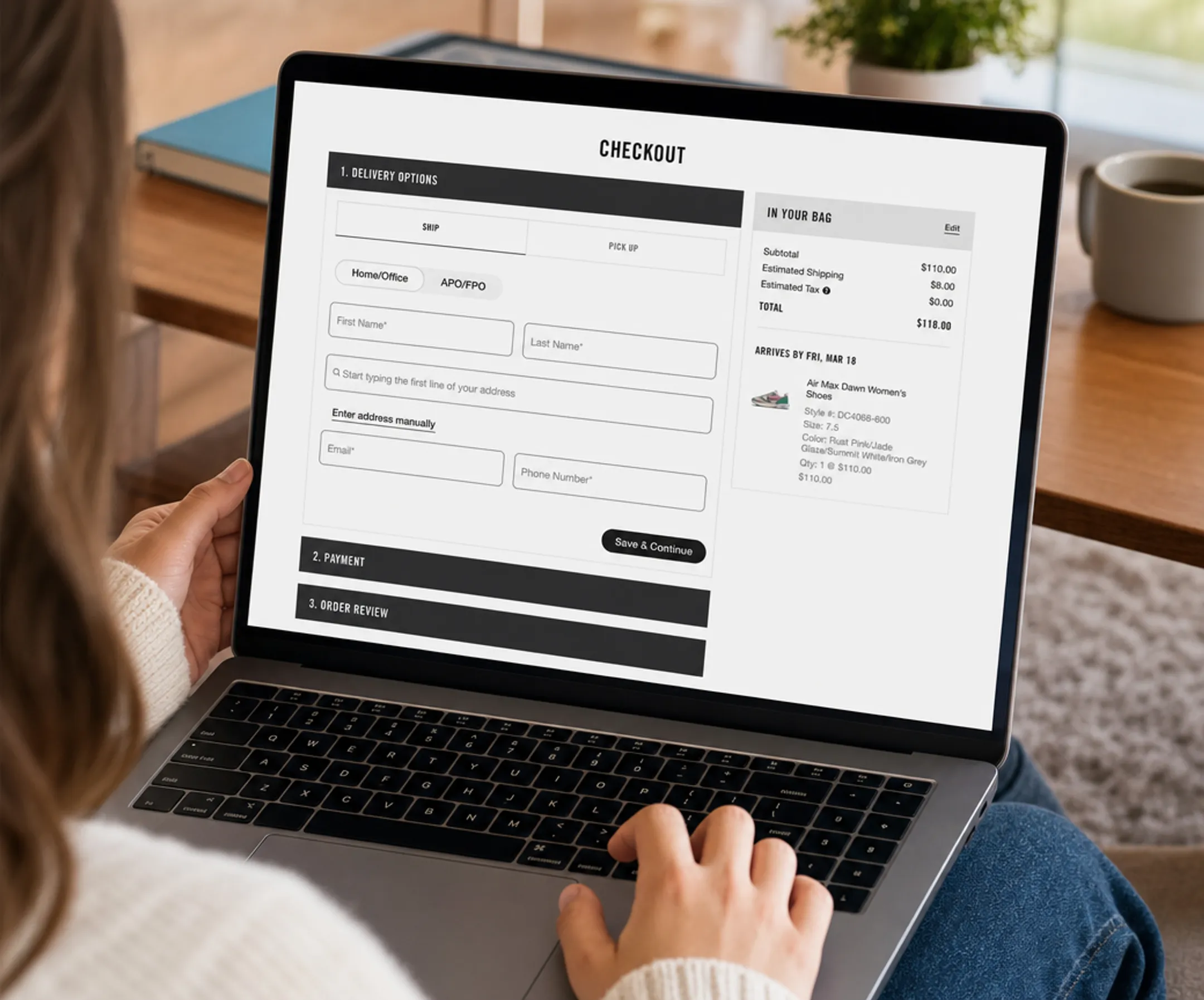 Online shopper reviewing checkout page with shipping cost details