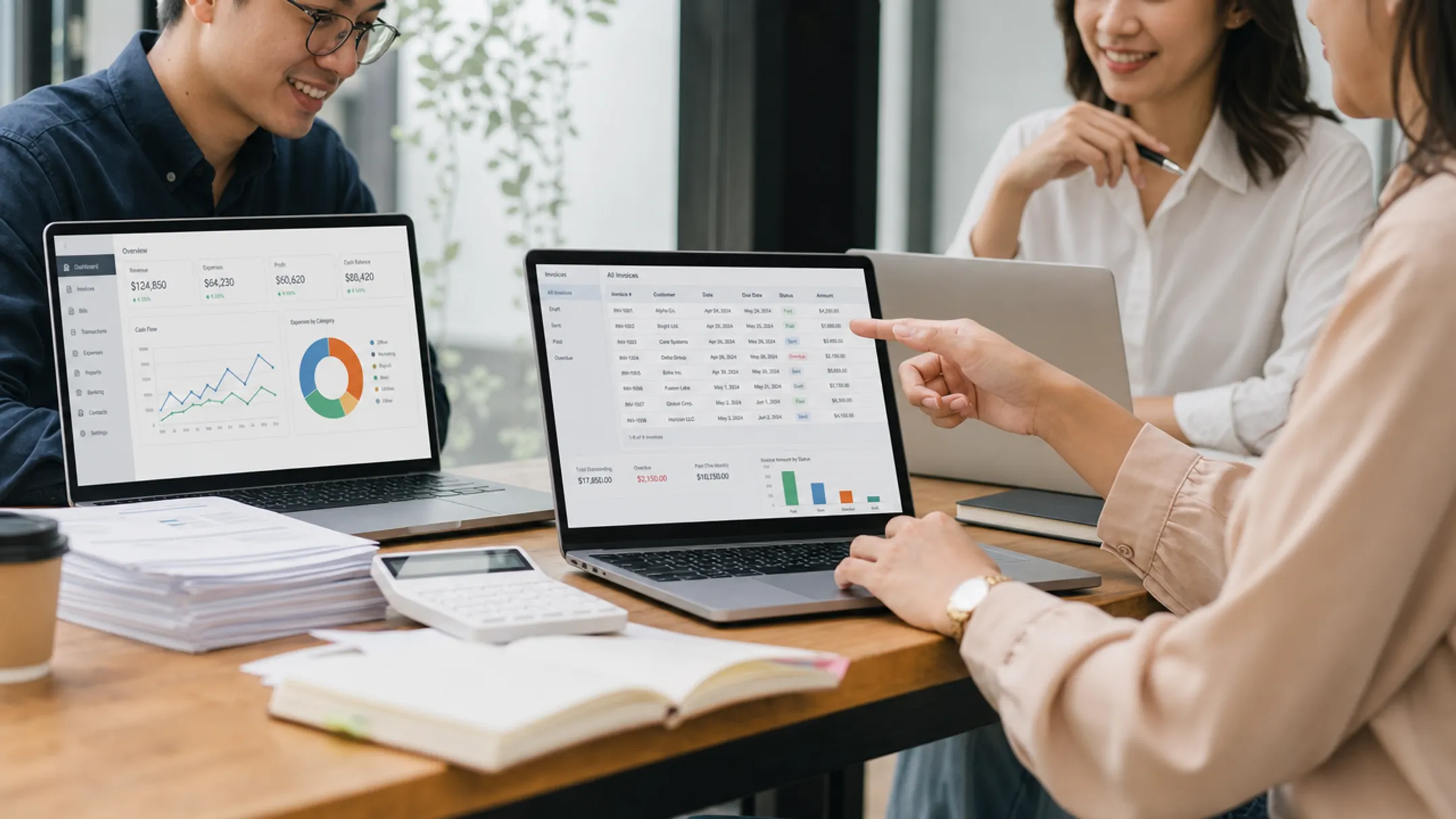 Small business team managing bookkeeping and invoicing on accounting software