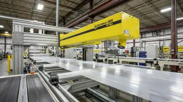 Hammer-IMS M-Ray millimeter wave sensor measuring moving web material on production line