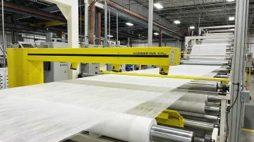 Hammer-IMS M-Ray system scanning nonwoven textile web on live production line