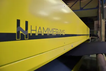 Advanced industrial measurement equipment in modern manufacturing facility