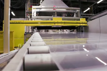 Contactless industrial measurement sensor scanning production material