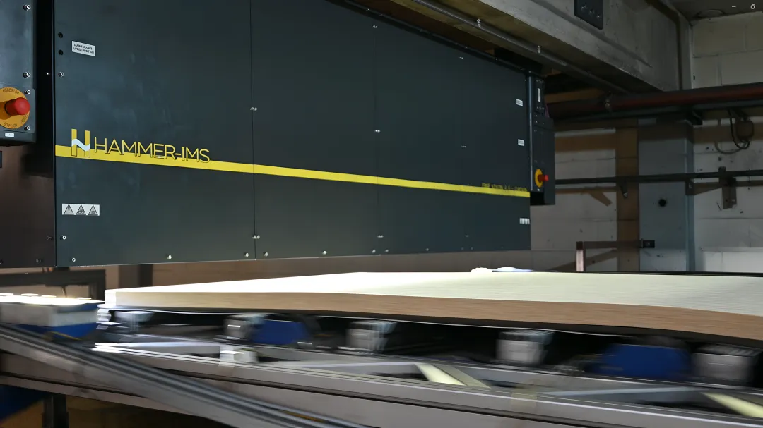 Transparent plastic sheet being measured by contactless millimeter wave sensor