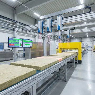 Advanced insulation board density measurement system in industrial manufacturing facility