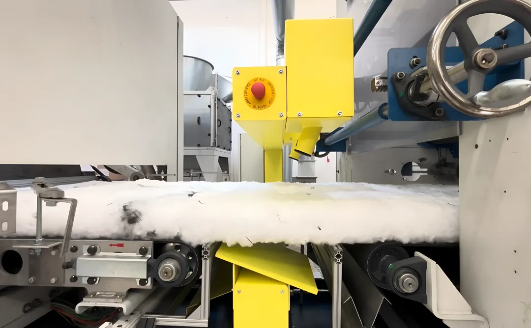 Inline contactless measurement system scanning textile fabric on a high-speed production line