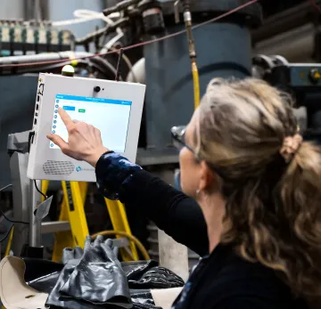 Engineer reviewing secure machine access controls