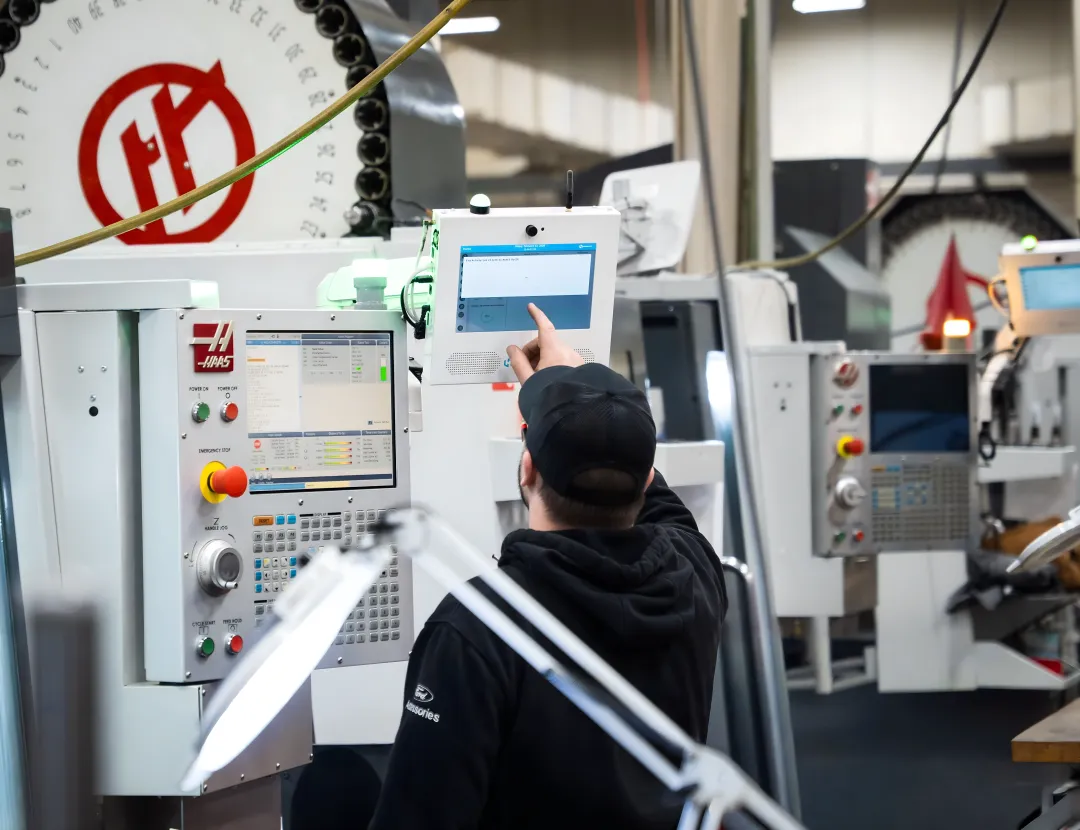 Manufacturing software implementation team connecting shop floor systems