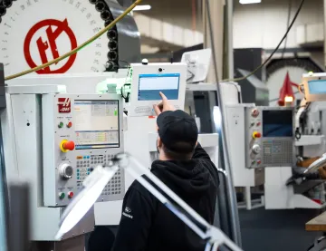 Manufacturing software implementation team connecting shop floor systems