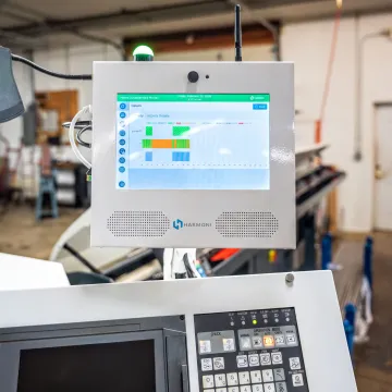 Quality manager reviewing digital inspection data