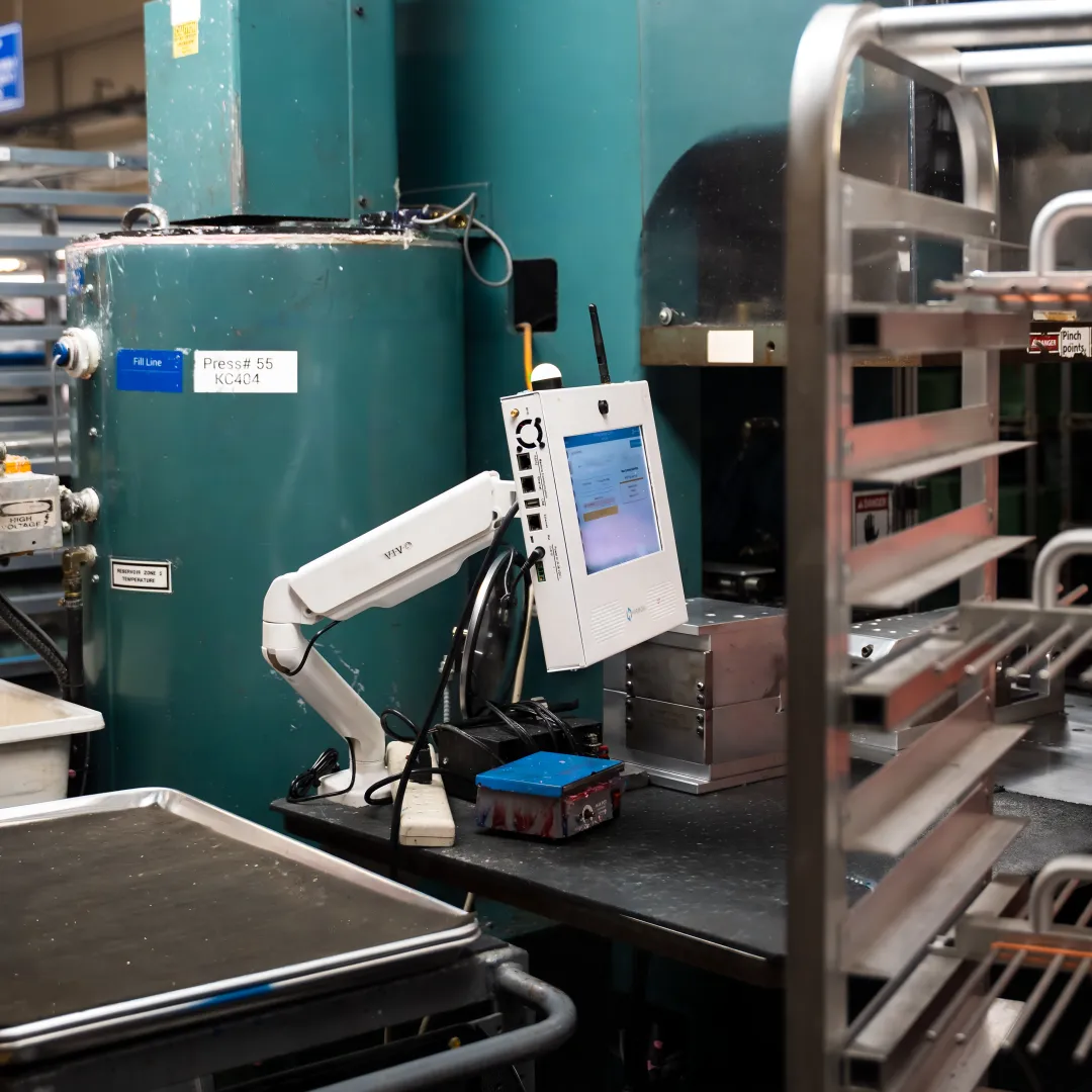 Engineer reviewing machine data integration workflow