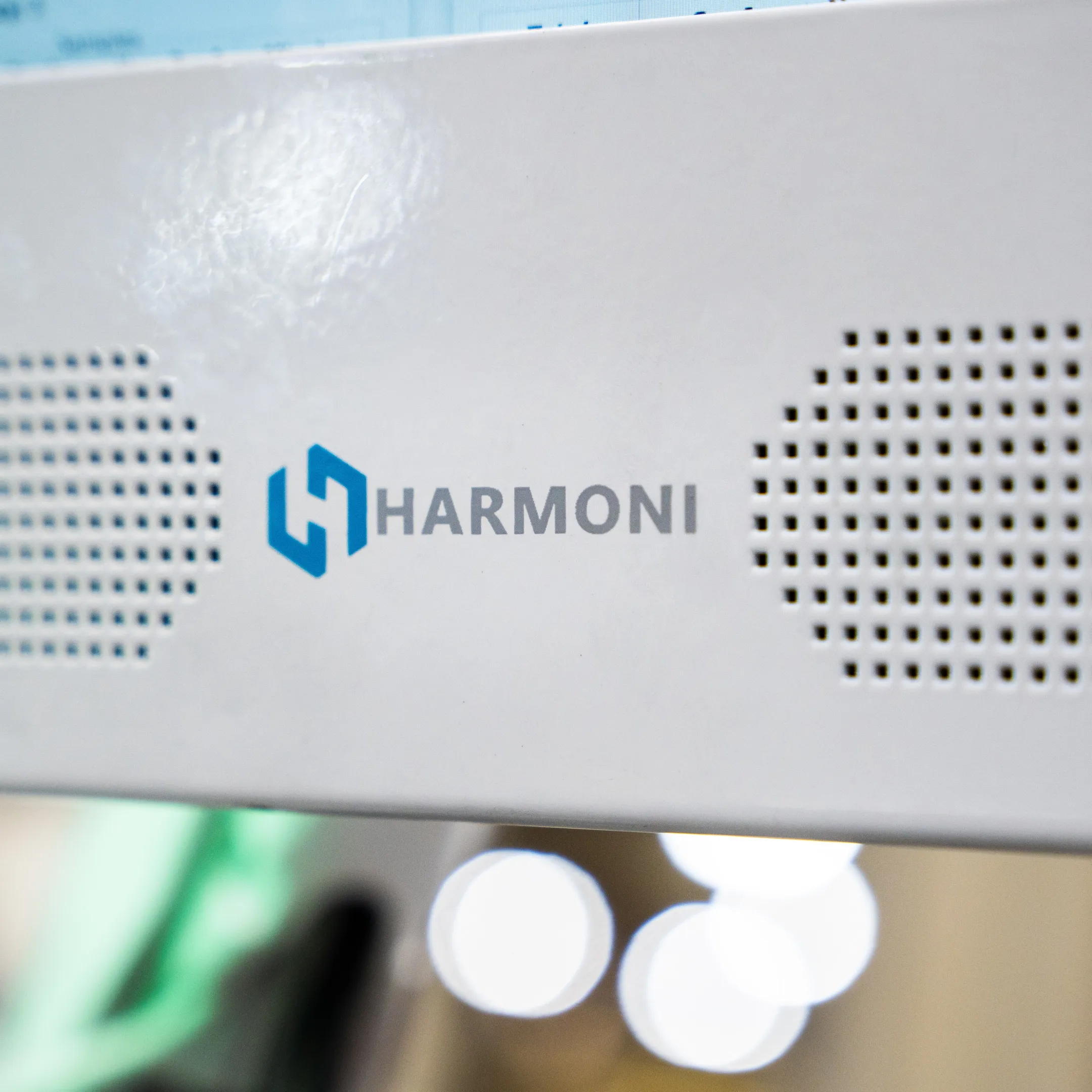 Live OEE metrics displayed beside CNC machines