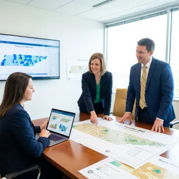 Rural healthcare strategy team reviewing Tennessee health data