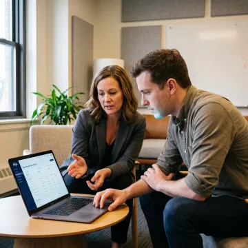 Benefits manager reviewing online enrollment steps