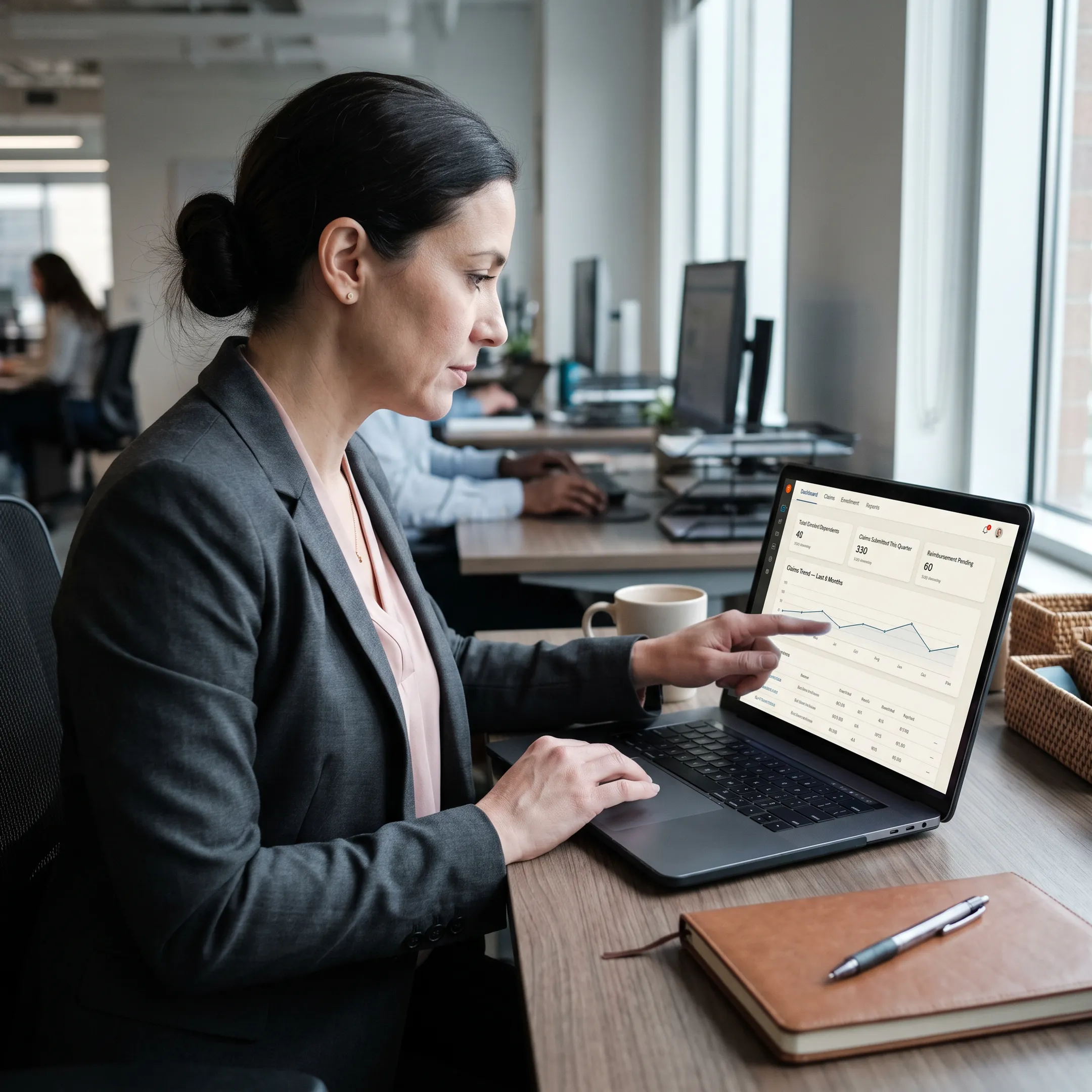 HR specialist reviewing dependent care FSA administration software on laptop