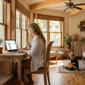 Parent using childcare app at home