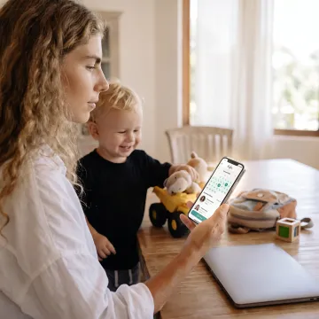 Parent and child using a childcare support app