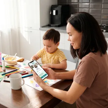 Parent using a childcare benefits app