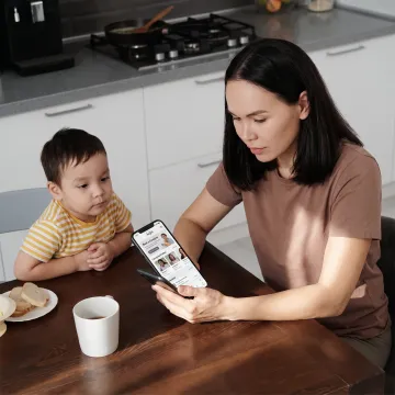 Parent accessing childcare benefits on phone