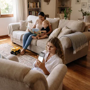 Working parent using a childcare benefits app