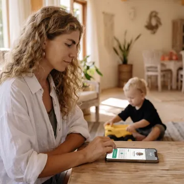Working parent using a care benefits app