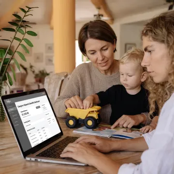 Working parent reviewing caregiver stipend options