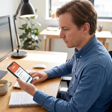 Employee booking family care on a phone