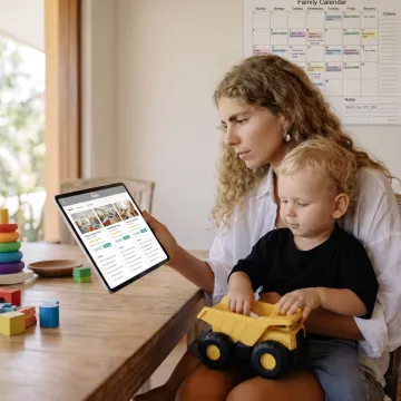 Working parent reviewing childcare options with a care specialist