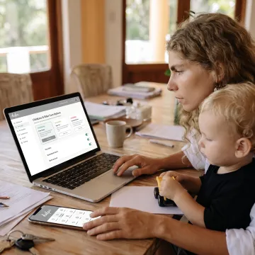 Employee reviewing family care options with Helpr