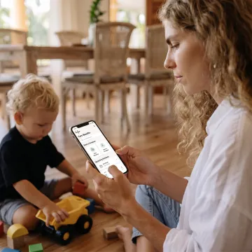 Working parent using a care benefits app