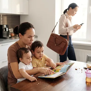 Parent and young child with a trusted caregiver