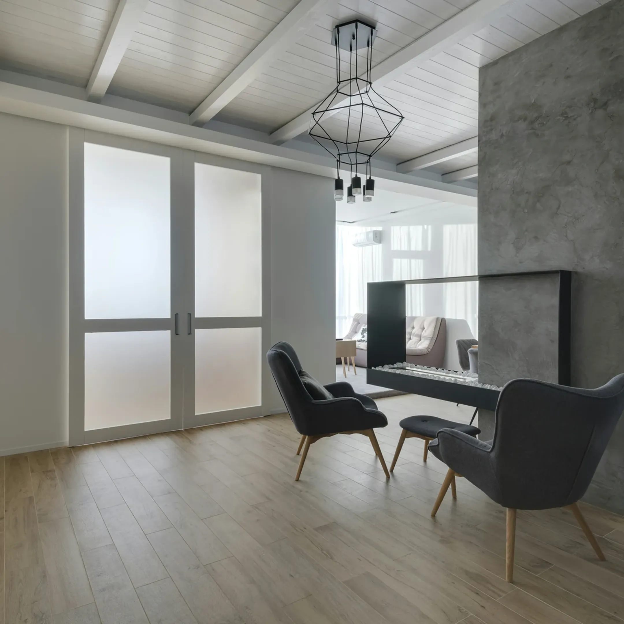 Thoughtfully designed sensory calm room with soft seating and diffused ambient lighting