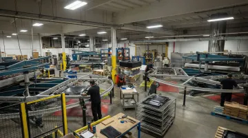 Hill Plastics thermoforming facility showing production machines and manufacturing floor