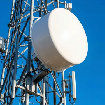 Custom thermoformed 5G antenna radome protecting telecommunications equipment